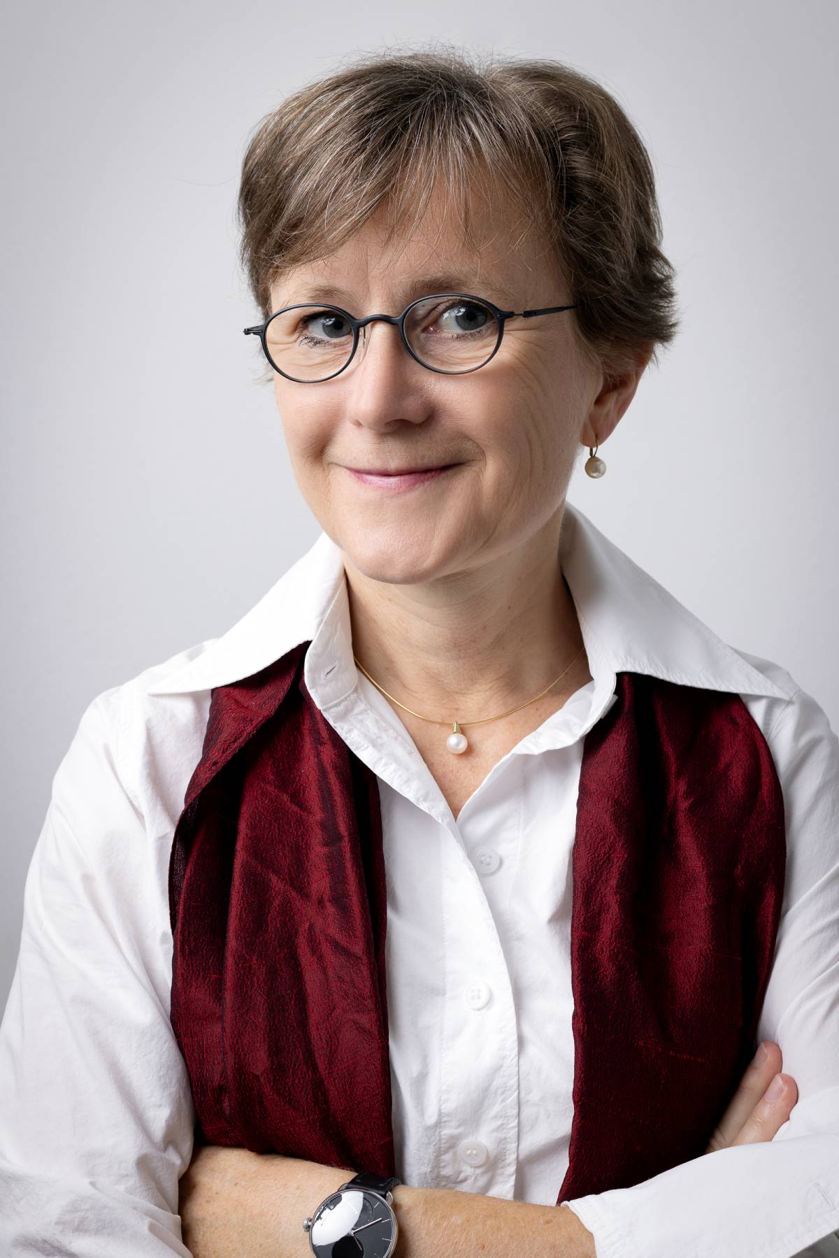 Professional portrait of Petra Nieckchen smiling confidently